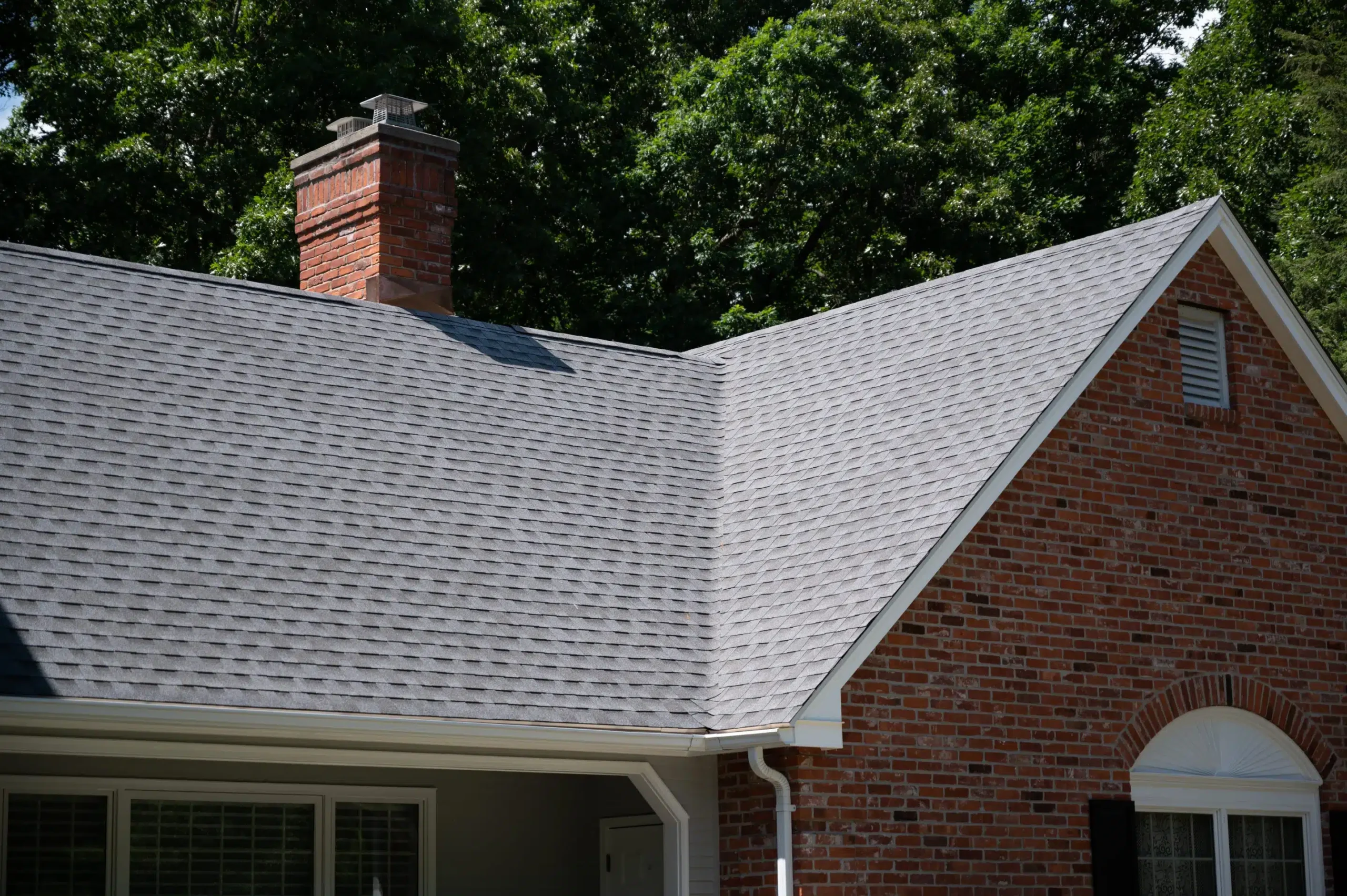Valley Roofing and Restoration light grey shingles roof